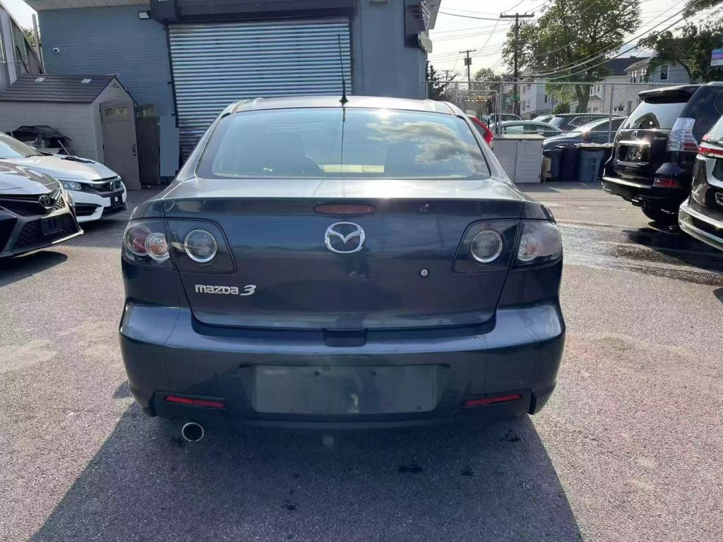2009 MAZDA MAZDA3 I TOURING VALUE SEDAN 4D PIC4.jpg